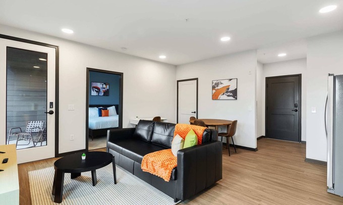 Lockerbie Square Apartment | CozySuites Mass with parking, lounge and roof deck 3