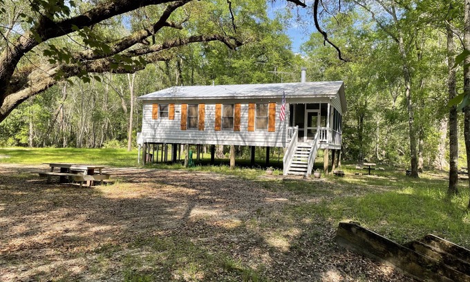 Claxton Cabin | Creekside Hunting and Fishing Cabin overlooking Lotts Creek on 190 acres