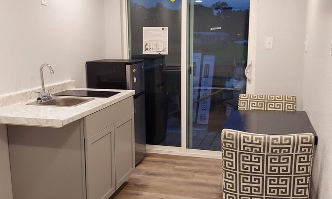 Brazoria Cabin | Custom Container Home w/ walk-in shower and patio! Walking distance to the river