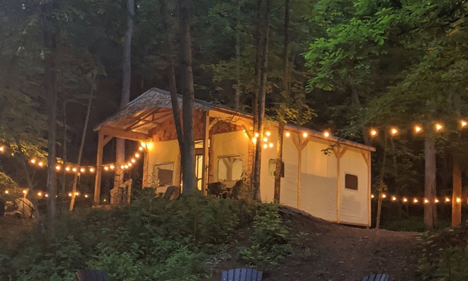 Wooster Cabin | Custom design Safari Tent overlooking a serene running creek & natural waterfall