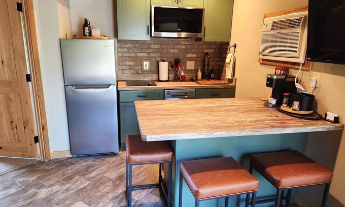 Mancelona Condo | Cute, 1 bdrm sleeps 2 Golf/ski. pool and Wifi! new KING bed. NEW kitchen coming