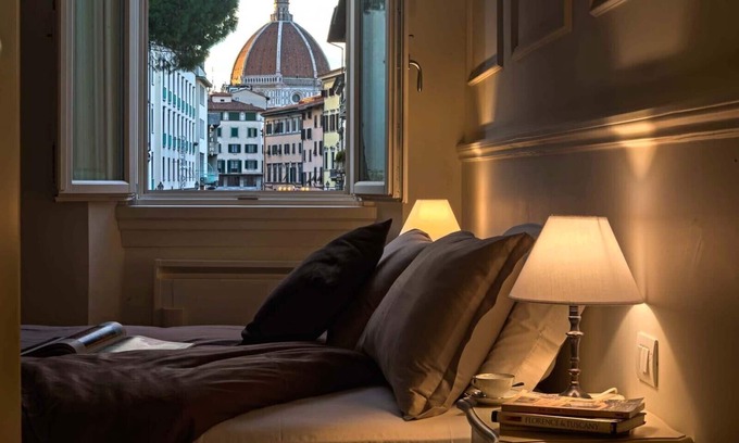 Sant' Ambrogio Apartment | Deluxe suite with great view! Bed and view in the heart of Florence.