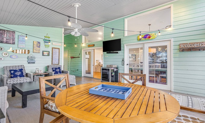 Rehoboth by the Sea House | Dewey Beach home with enclosed lanai, hot tub, patio & firepit - 1 dog welcome