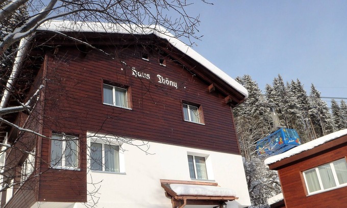 Arosa Apartment | Direct access to Train Station, Cable Car, Chair Lift and home run, free WI-FI