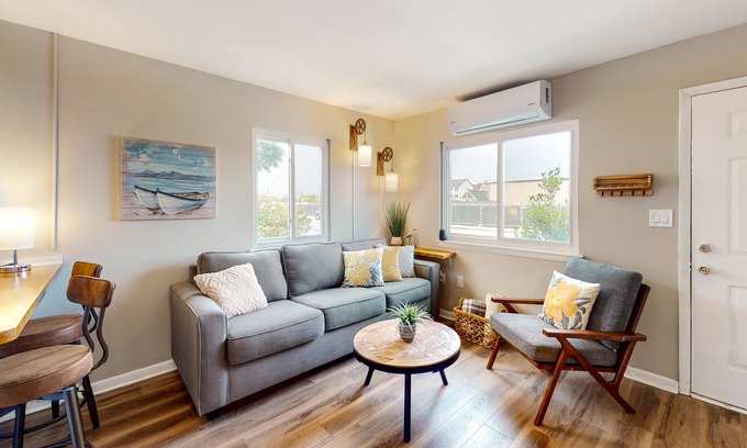 Caine Woods Condo | Dog-friendly condo near beach with updated interior & private W/D