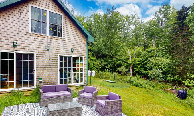 Stockton Springs Cottage | Dog-friendly home in the trees with ocean view & patio - near Fort Point