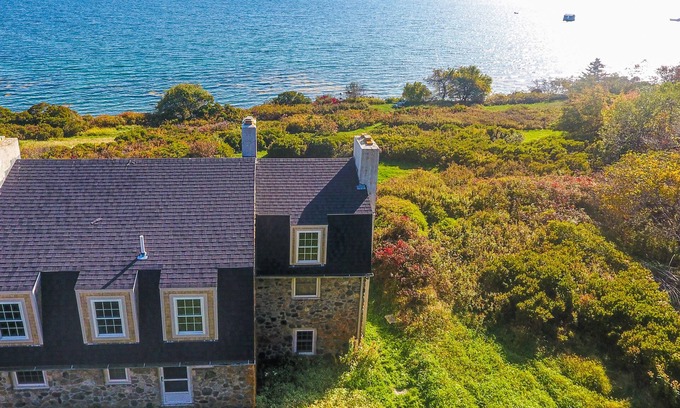 Brooklin House | Dog-friendly oceanfront stone house with beach access, stunning views & deck