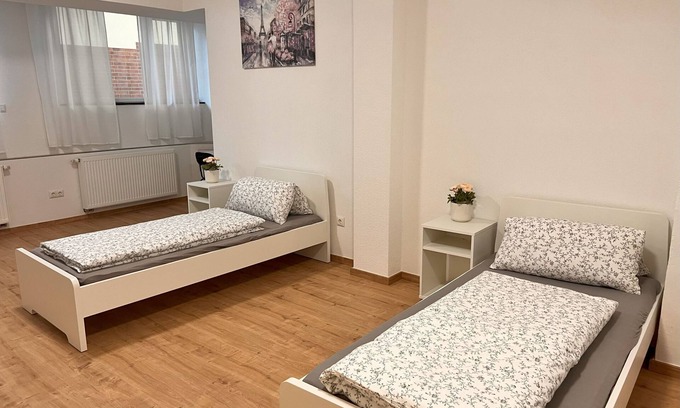 Wesertor Apartment | Doppelzimmer mit Gemeinschaftsbad