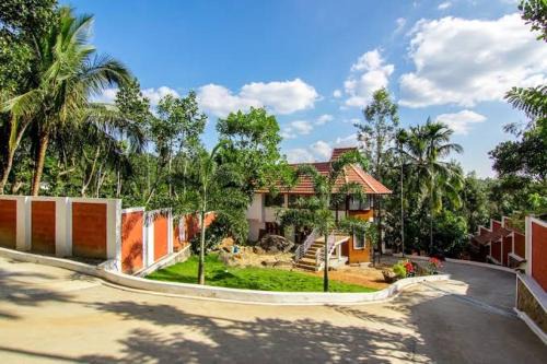 Sulthan Bathery Resort | Edakkal Village Resort - A Premium Boutique Lodging, Wayanad
