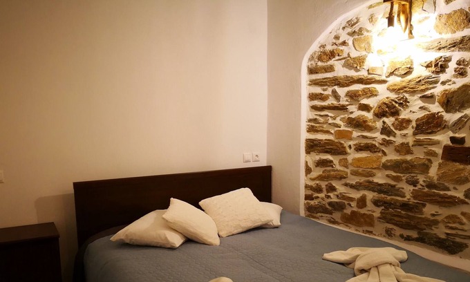 Portaria House | Effrosini Traditional home , with garden view and fireplace