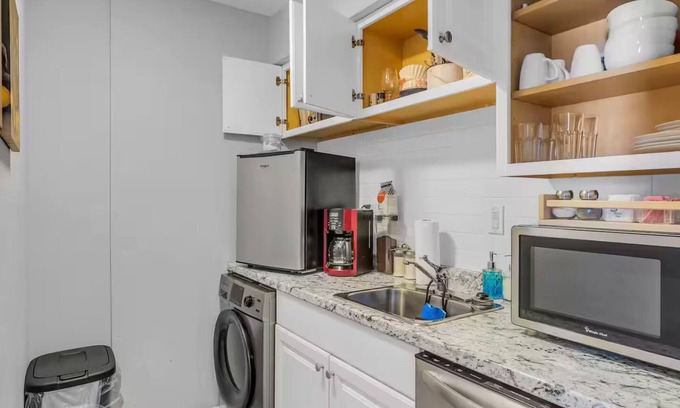 Lawrence Apartment | Elegant 3BR Retreat: Comfort, Style Prime Location