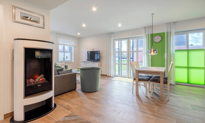 Greetsiel Apartment | Ella - Moderne und Komfortable Ferienwohnung mit Sonniger Terrasse