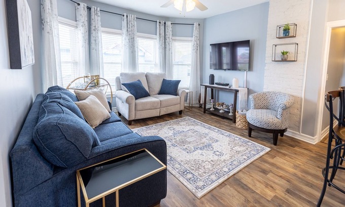 Oswego Apartment | Elysian Loft – Where Serenity Meets Style, Your Tranquil Retreat Above the Spa