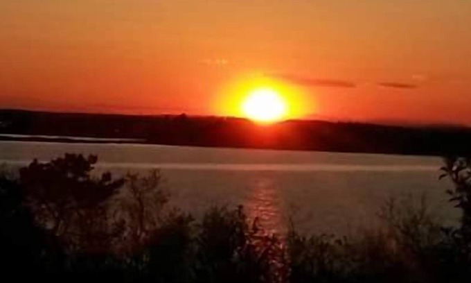Mid-Coast and Islands House | Enjoy picturesque inlet views of a working harbor and sunny days at your oceanfront cottage