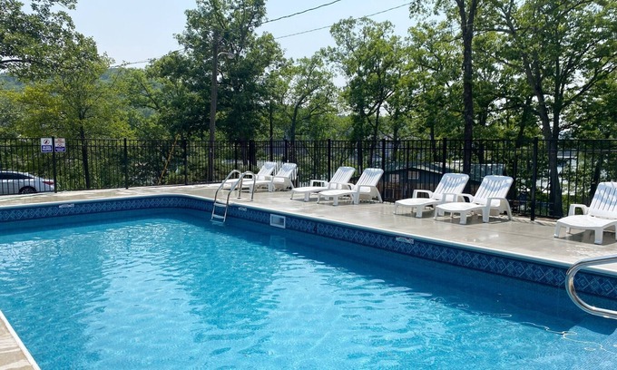 Camdenton Cabin | Enjoy the Quiet Side of the Lake With Resort Amenities + Pool.