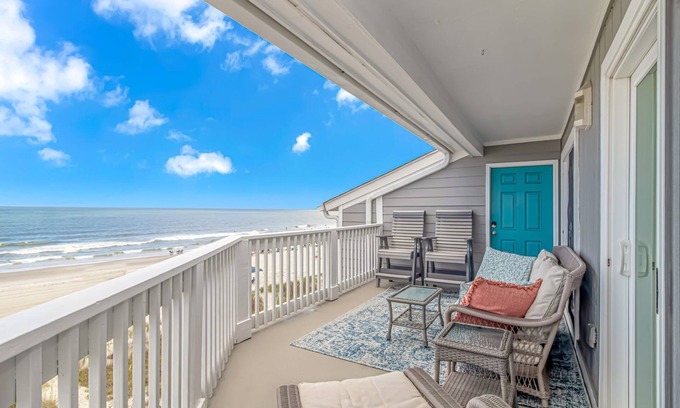 Surfside Beach Condo | Enjoy the warm breeze from your balcony. Baste in the sun. Walk to dinner!n