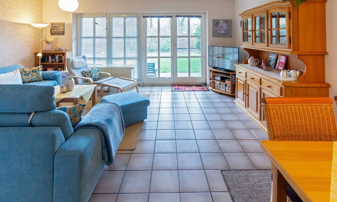 Dornum Apartment | Erdgeschoßwohnung Friesenperle mit Terrasse und Garten