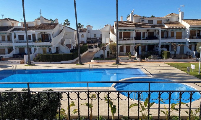 Torre de la Horadada House | Cozy Bungalow with terrace overlooking swimming pool.