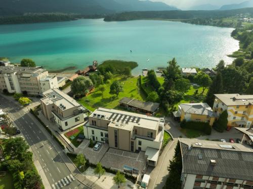 Egg am Faaker See Apartment | Exklusive Rückzugsorte direkt am türkisblauen See