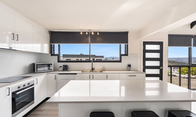 Claremont Apartment | Expansive River-View Oasis