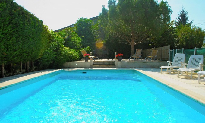 Migron House | Fabulous gite with pool, orchard and in village with bar, baker & shops