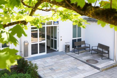 Munchen District House | FANA Pension