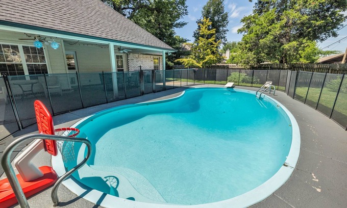 Tulsa House | Fenced in Pool-Jacuzzi Tub-Walk to Dining & Shopping-Garage Parking-Gym