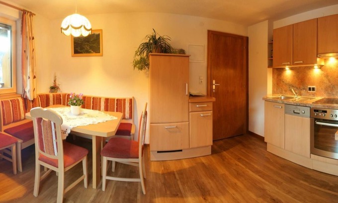 Wenns Apartment | Ferienwohnung Panoramablick - Haus Hochzeigerblick