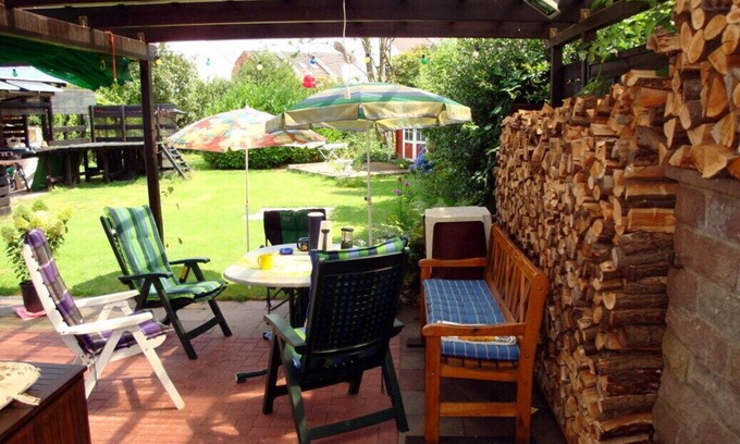 Konigsheide Apartment | " FeWo Königsheide " - outskirts on the ground floor with large garden terraces barbecue