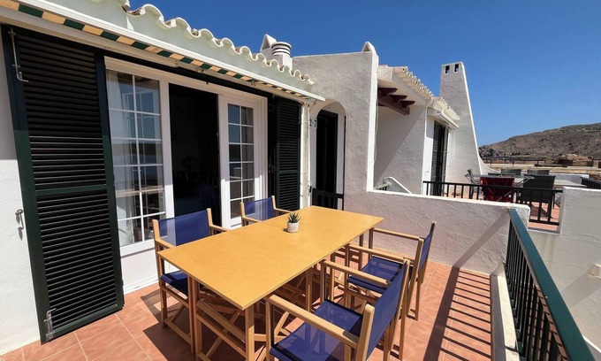 Fornells Apartment | Front sea line and with pool in Fornells