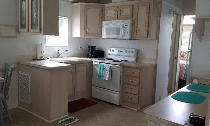 Upper Grand Lagoon Cottage | Gated great for families and winter guests Other units inquire if unit booked