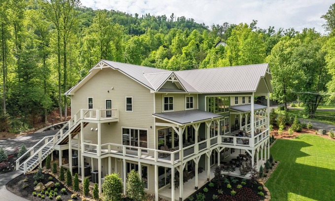 Gatlinburg Cabin | GATLINBURG LUXURY 21 BEDROOM! Elevator, Pool, Private Pavilion, Movie Theater.