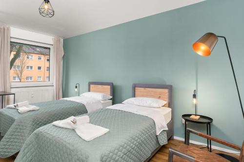 Niederzwehren Apartment | Gemütliche Wohnung - 7 Betten - Balkon - Waschtrockner - Smart TV
