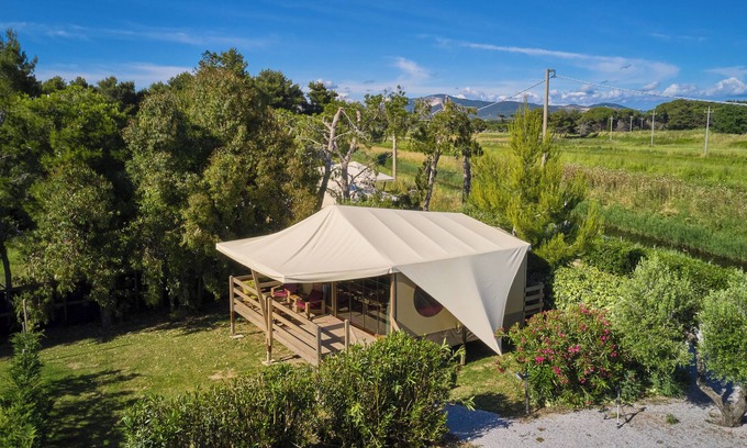 Piombino RV Rental | Glamping 'Familiare Vicino Al Mare' with Private Terrace, Private Garden and Wi-Fi