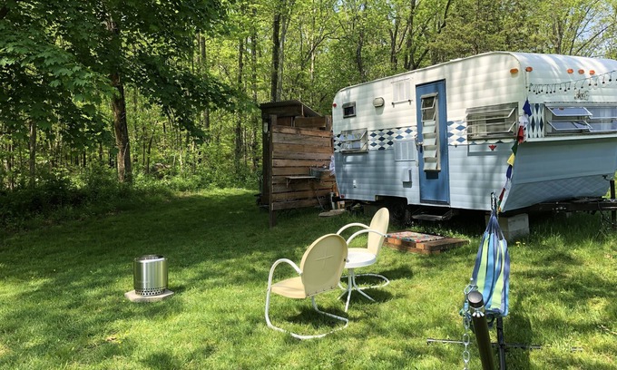 Cranston House | Glamping with sheep in a renovated 1972 Ace camper on 48 acres