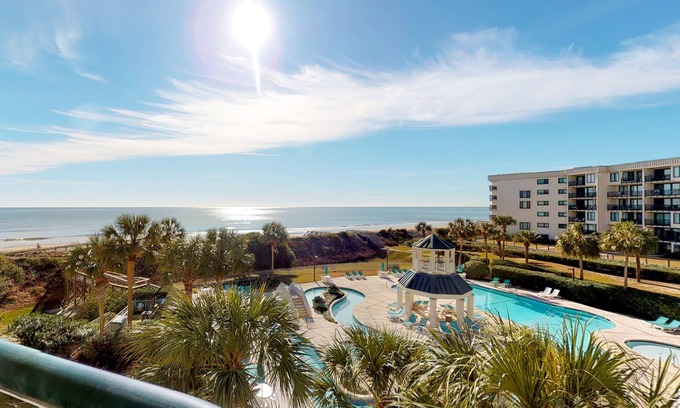 Litchfield by the Sea Condo | Gorgeous family-friendly condo w/shared pool & ocean views - close to the beach