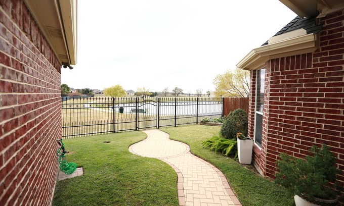 Hurst House | Gorgeous View Home backing up Community LAKES & Trail