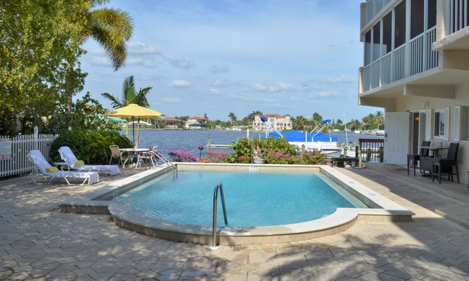 Vanderbilt Beach Condo | Gorgeous Waterfront Property On Vanderbilt Bay. Beach Access Just Steps Away.