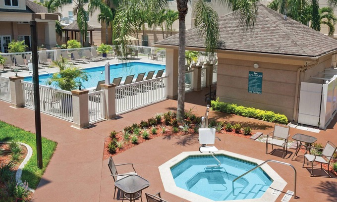 Villas Hotel | Great Location! Outdoor Pool, Minutes to Bell Tower Shops and Fish Tale Marina!