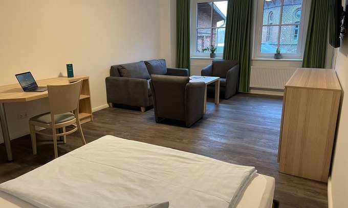 Pasewalk Apartment | Guest house Besandung vacation apartment - Lokschuppen Pasewalk- guest houses with double rooms, single rooms