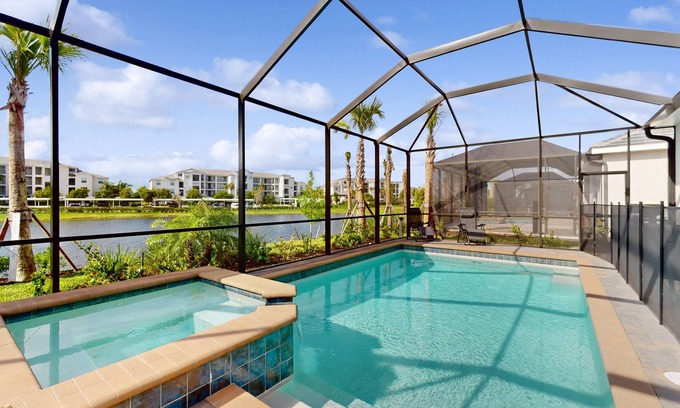 Punta Gorda House | Heritage Landing home with water views, private pool, spa, grill kitchen, & W/D