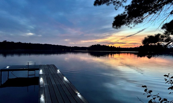 Traverse City Cottage | Hidden Gem Traverse City Lake House with Private Frontage & Sunset Views, Kayaks