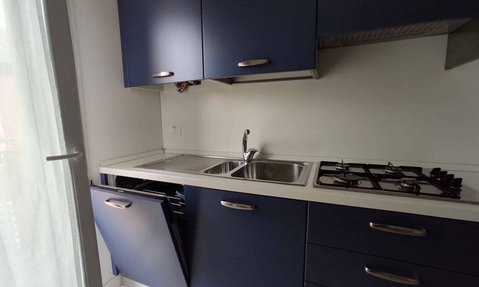 Eraclea Mare Apartment | Holiday apartment with air conditioning and balcony overlooking the pine forest