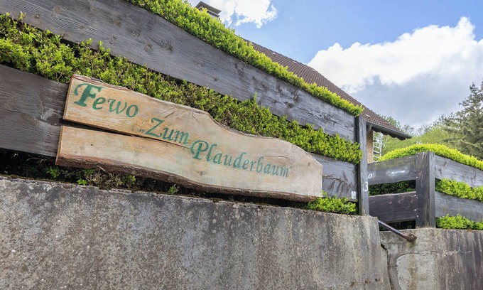 Balve Apartment | Holiday Apartment 'Zum Plauderbaum' with Private Terrace, Private Garden and Private Outdoor Whirlpool