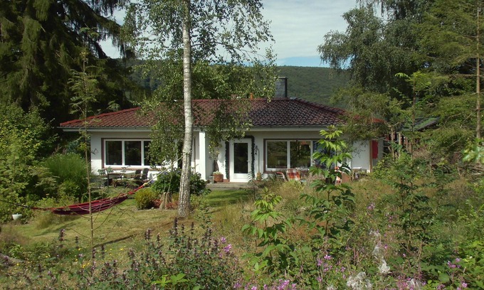 Bodenfelde House | Holiday home complex Hilkenberg: House 3 with fireplace and. wild and romantic garden