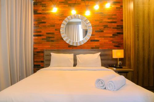 Pondokcina Apartment | Homey 1BR at 15th Floor Apartment at Atlanta Residences By Travelio