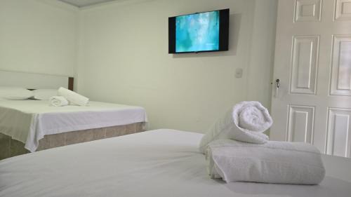 Sevilla Hotel | Hotel Valle del Café - Habitación 3 Grupo con 2 Camas