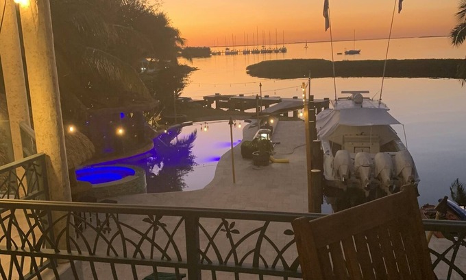 Key Largo House | House and guest house with Boat dock, sunsets, jacuzzi, pool, slide, tiki, etc
