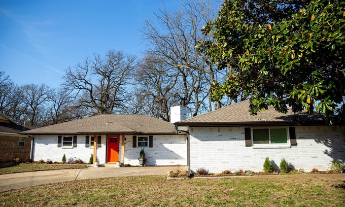 Checotah House | House on the lake with a large sandy beach just steps from the back door.