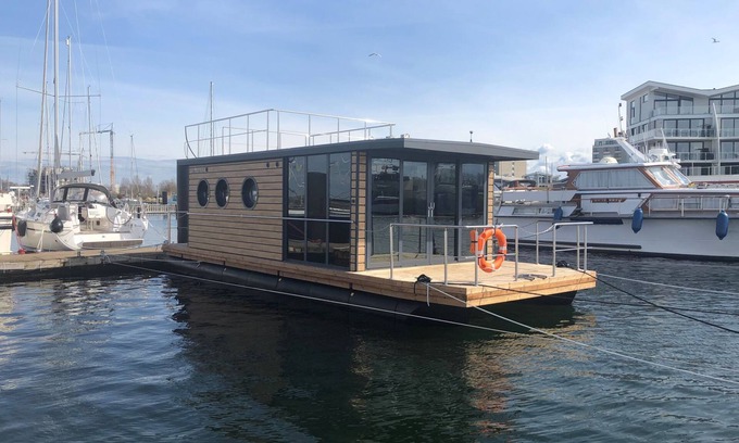 Wendtorf Boat Rental | Houseboat Fjord Auriga with bio sauna and roof terrace in Wendtorf/Kiel Fjord